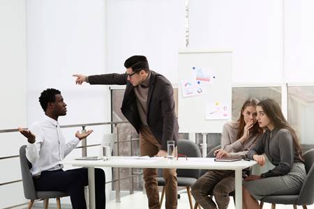 Coworkers yelling at differently colored coworker - Racial Discrimination